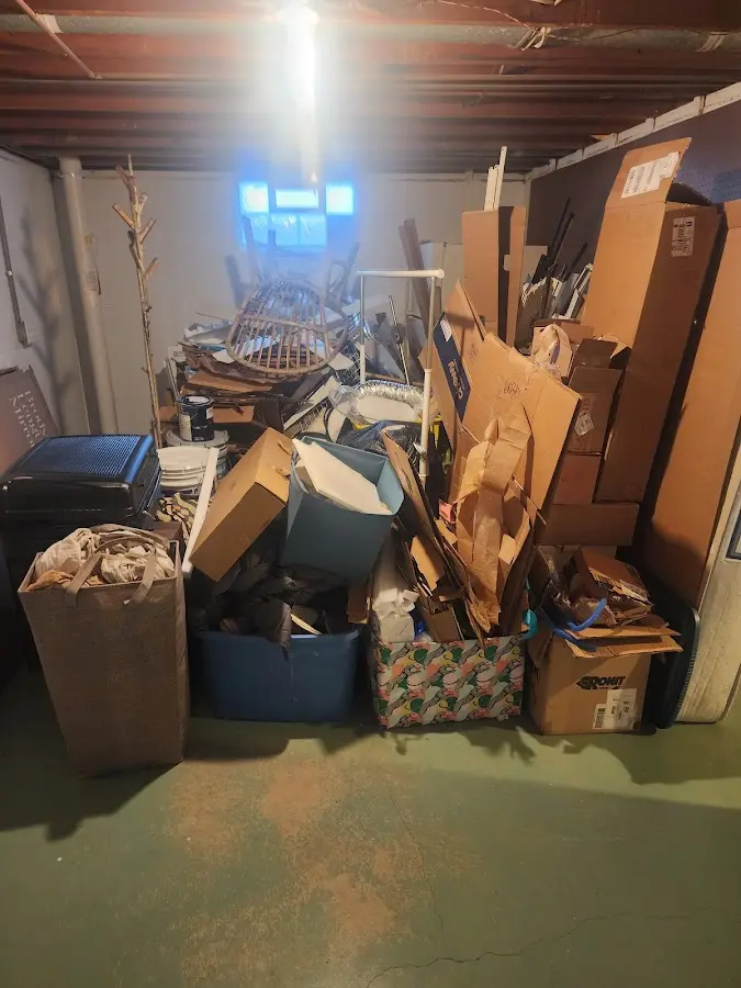 Roll-off dumpster container at job site for 2 Yard Dumpster Rental in Burr Ridge